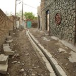 عملیات جدول گذاری ،ساماندهی و اصلاح آبروها در کوچه شهید نامور رواسان