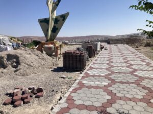 اتمام کفسازی پروژه سن روباز باغ موزه دفاع مقدس